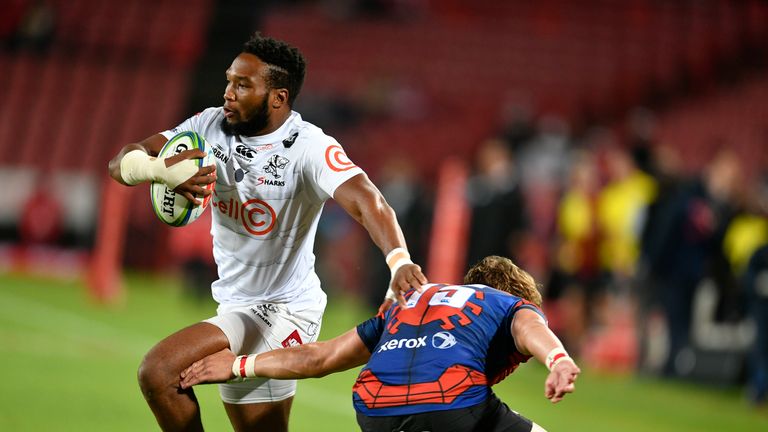 JOHANNESBURG, SOUTH AFRICA - APRIL 05:  Lukhanyo Am of the Cell C Sharks and Andries Coetzee of the Emirates Lions during the Super Rugby match between Emirates Lions and Cell C Sharks at Emirates Airline Park on April 05, 2019 in Johannesburg, South Africa. (Photo by Lefty Shivambu/Gallo Images)