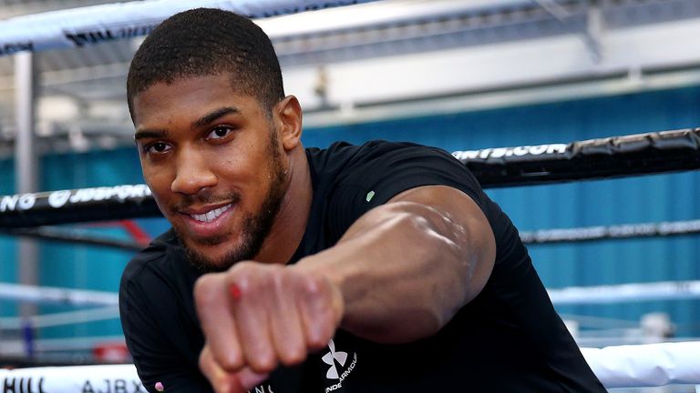 Anthony Joshua poses for photographers after a training session during the Anthony Joshua Media Day at the English Institute of Sport on May 01, 2019 in Sheffield, England.