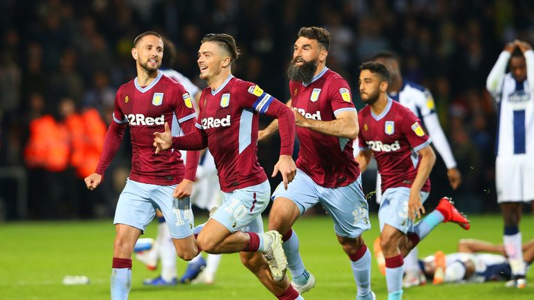 Aston Villa celebrate winning the Championship play-off semi-final against West Brom on penalties