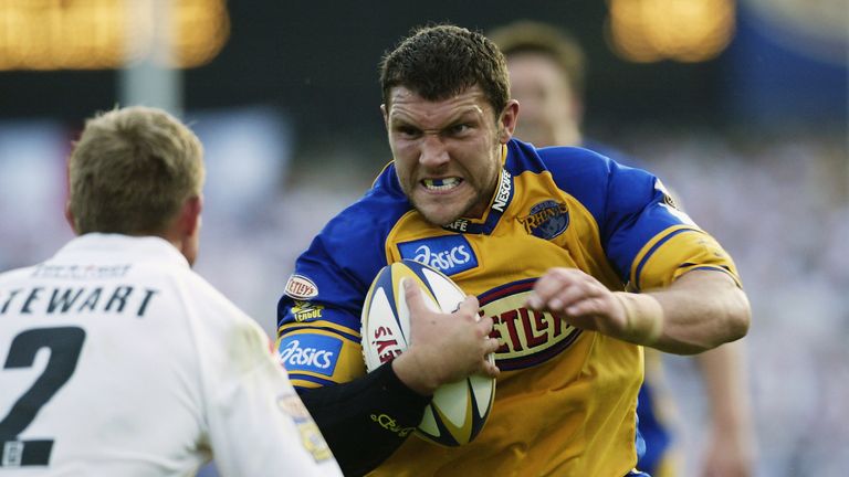 LEEDS - JUNE 13: Barrie McDermott of Leeds Rhinos charges at Anthony Stewart of St Helens during the Tetley's Super League match between Leeds Rhinos and St Helens held on June 13, 2003 at the Headingley Stadium in Leeds, England. Leeds Rhinos won the match 20-14. (Photo by Alex Livesey/Getty Images)