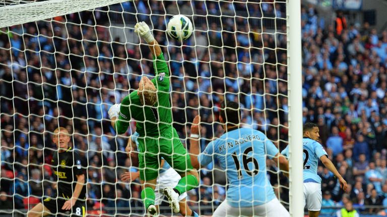 Ben Watson's header secured a memorable win for Wigan over Manchester City