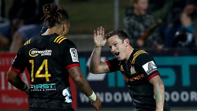 HAMILTON, NEW ZEALAND - MAY 11: Brad Weber of the Chiefs (R) celebrates his try with Sean Wainui (L) during the round 13 match between the Chiefs and the Sharks at FMG Stadium on May 11, 2019 in Hamilton, New Zealand. (Photo by Phil Walter/Getty Images)