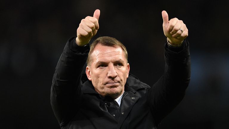 Brendan Rodgers acknowledges fans after the final whistle at the Etihad Stadium