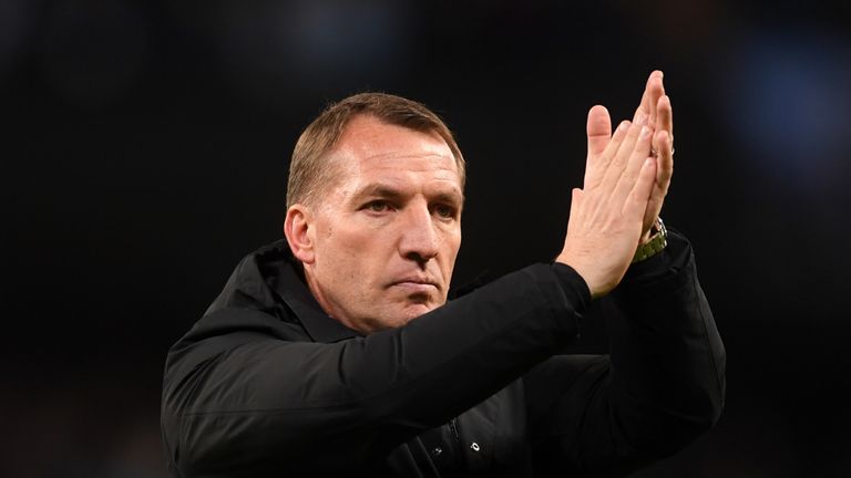 Brendan Rodgers applauds fans after the 1-0 defeat to Manchester City at the Etihad Stadium