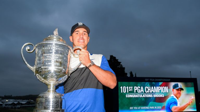 Brooks Koepka lifts the Wanamaker Trophy after his PGA Championship success