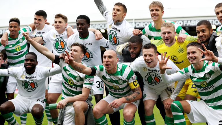 The Celtic team celebrate winning the match and the title after the Ladbrokes Scottish Premiership match between Aberdeen and Celtic at Pittodrie Stadium on May 04, 2019 in Aberdeen, Scotland.