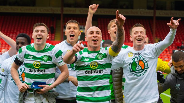 Celtic's Kieran Tierney, Scott Brown and Callum McGregor (L-R) celebrate the title