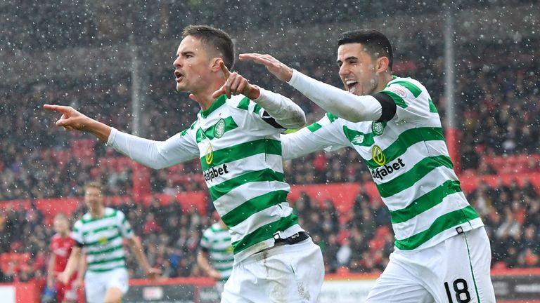 Celtic's Mikael Lustig (left) celebrates his goal against Aberdeen with Tom Rogic