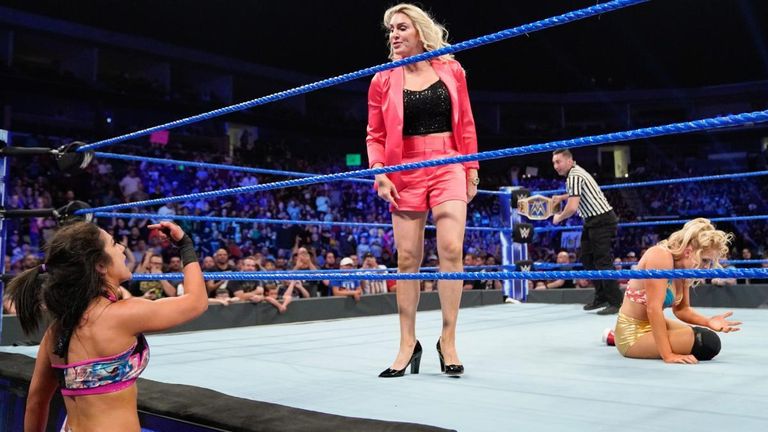 Bayley defeated Lacey Evans after Charlotte Flair got caught up in their match