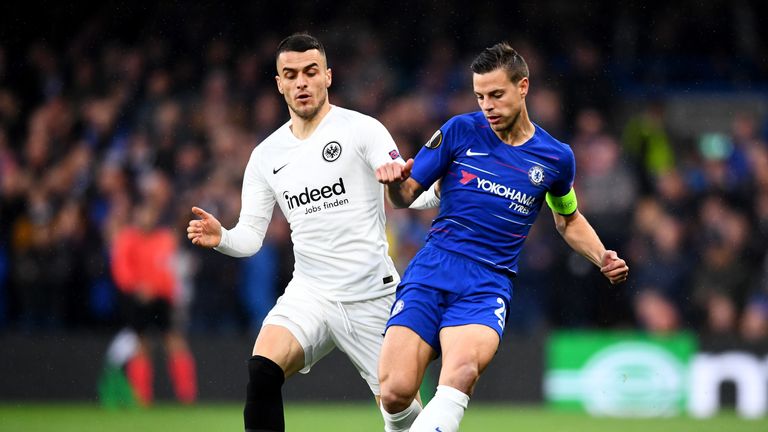 Chelsea's Cesar Azpilicueta passes the ball under pressure from  Eintracht Frankfurt's Filip Kostic 