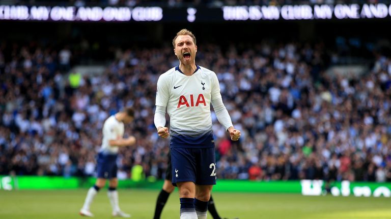 Christian Eriksen celebrates his brilliant free-kick against Everton