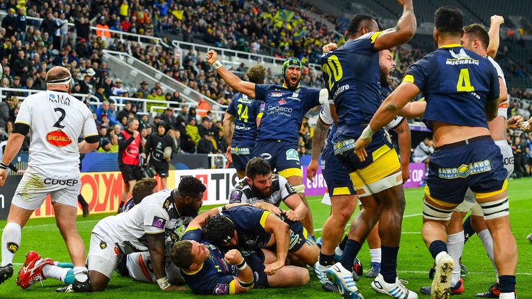 Clermont players celebrate after their pivotal second try via Fritz Lee at the back of a maul