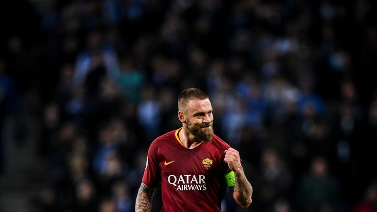 Roma's midfielder Daniele De Rossi celebrates a goal during the UEFA Champions League round of 16 second leg football match between FC Porto and AS Roma