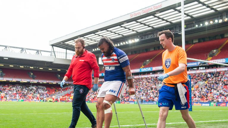 Picture by Allan McKenzie/SWpix.com - 25/05/2019 - Rugby League - Dacia Magic Weekend 2019 - Wakefield Trinity v Catalans Dragons - Anfield, Liverpool, England - David Fifita limps off on crutches after an injury.