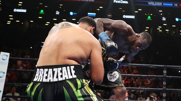 Deontay Wilder floors Dominic Breazeale with a huge right hand