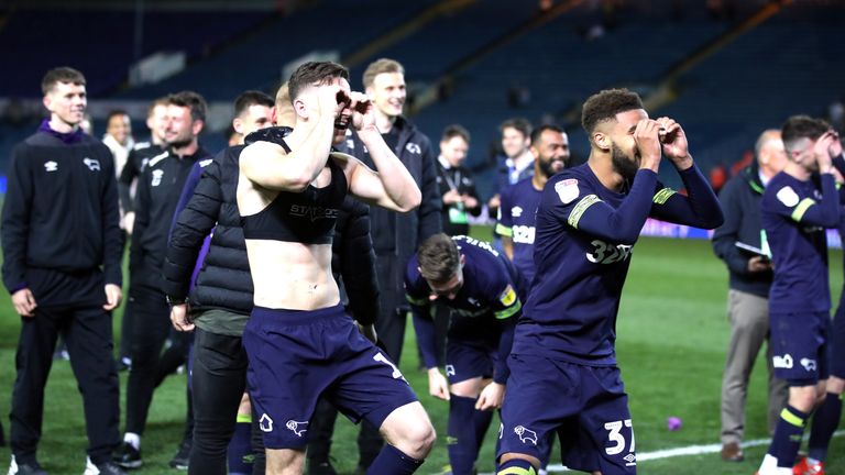 Derby County's Tom Lawrence (left) and Jayden Bogle make binocular gestures 