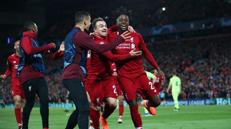 Divock Origi celebrates scoring Liverpool's fourth goal in the 4-0 win over Barcelona in their Champions League semi-final, second leg