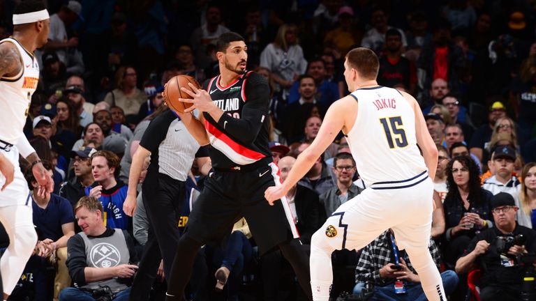 Enes Kanter #00 of the Portland Trail Blazers handles the ball against Nikola Jokic #15 of the Denver Nuggets during Game Five of the Western Conference Semi-Finals of the 2019 NBA Playoffs on May 7, 2019 at the Pepsi Center in Denver, Colorado.