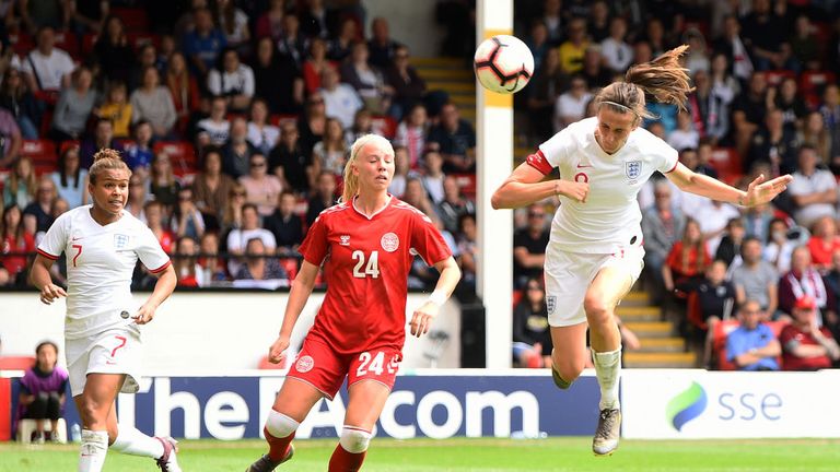 Jill Scott heads home England's second against Denmark
