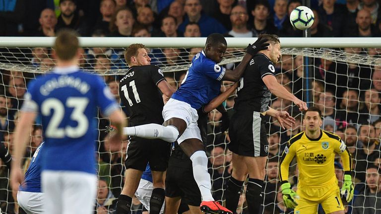 Kurt Zouma challenges for a header