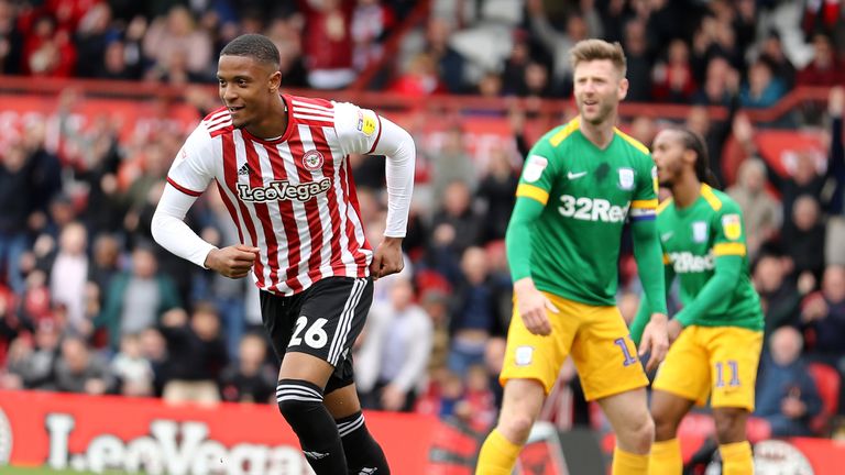 Ezri Konsa turns to celebrate scoring during the Sky Bet Championship match between Brentford and Preston North End