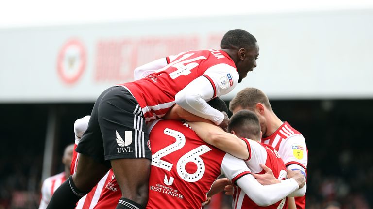 Ezri Konsa celebrates with team mates after scoring during the Sky Bet Championship match between Brentford and Preston North End at Griffin Park