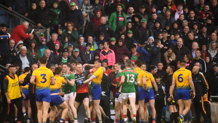 Players tussle before leaving the pitch at half-time during the Connacht GAA Football Senior Championship Semi-Final match between Mayo and Roscommon at Elverys MacHale Park