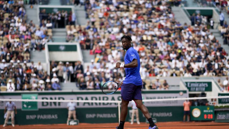 Gael Monfils celebrates at the French Open