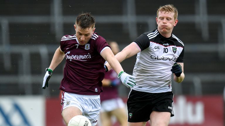 Padraic O'Donnell of Galway in action against Stephen Connolly of Sligo
