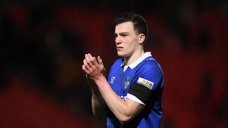Oldham's George Edmundson has been linked with a move to Scottish side Rangers.