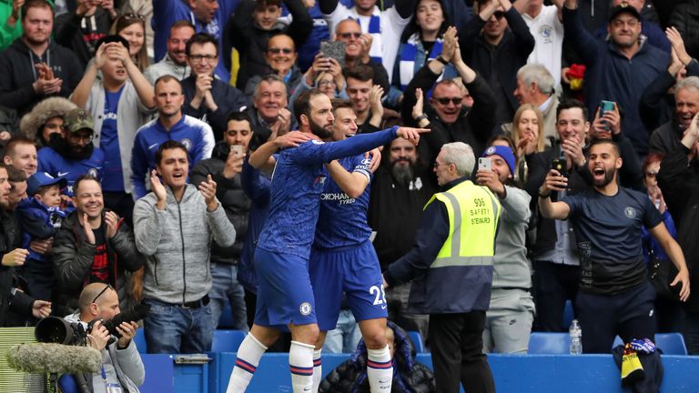 Gonzalo Higuain celebrates after scoring Chelsea's third goal