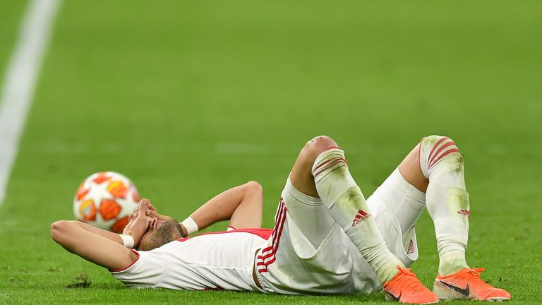AMSTERDAM, NETHERLANDS - MAY 08: Hakim Ziyech of Ajax is dejected after losing the UEFA Champions League Semi Final second leg match between Ajax and Tottenham Hotspur at the Johan Cruyff Arena on May 08, 2019 in Amsterdam, Netherlands. (Photo by Dan Mullan/Getty Images )
