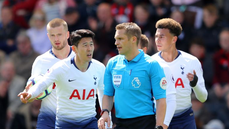 Heung-Min Son pleads his case with referee Craig Pawson