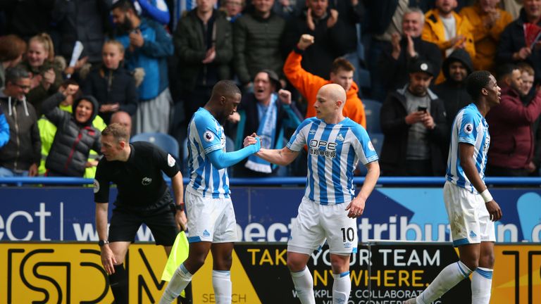 Isaac Mbenza of Huddersfield Town celebrates his equaliser with Alex Pritchard