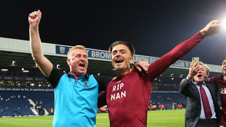 Jack Grealish of Aston Villa (10) celebrates victory in the penalty shoot out with Dean Smith, Manager of Aston Villa after the Sky Bet Championship Play-off semi final second leg match between West Bromwich Albion and Aston Villa at The Hawthorns on May 14, 2019 in West Bromwich, England. 