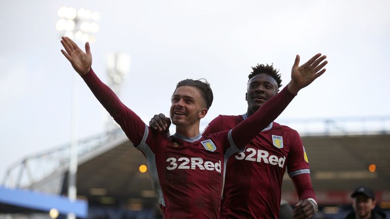 Aston Villa's Jack Grealish (centre) and Aston Villa's Tammy Abraham (right) celebrate after the final whistle during the Sky Bet Championship match at St Andrew's Trillion Trophy Stadium, Birmingham.