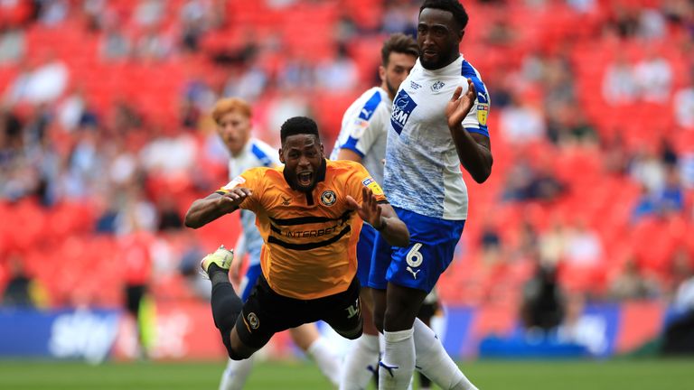 Newport County's Jamille Matt (left) reacts to a challenge from Tranmere Rovers' Emmanuel Monthe, leading to a penalty appeal during the Sky Bet League Two Play-off final at Wembley Stadium, London. PRESS ASSOCIATION Photo. Picture date: Saturday May 25, 2019. See PA story SOCCER League Two. Photo credit should read: Mike Egerton/PA Wire. RESTRICTIONS: EDITORIAL USE ONLY No use with unauthorised audio, video, data, fixture lists, club/league logos or "live" services. Online in-match use limited to 120 images, no video emulation. No use in betting, games or single club/league/player publications