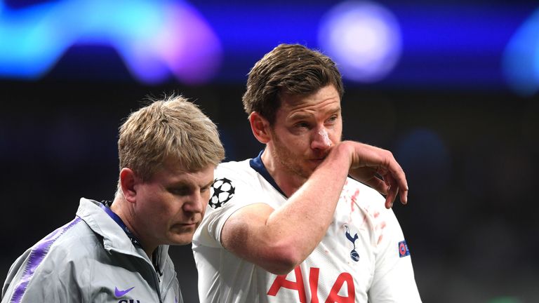Tottenham's Jan Vertonghen leaves the field after sustaining a head injury