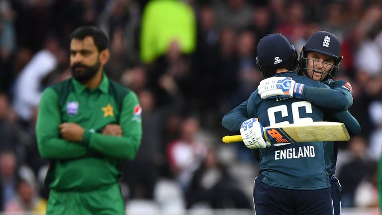 England batsman Jason Roy reaches his century and is congratulated by Joe Root as Hafeez reacts during the 4TH One Day International between England and Pakistan at Trent Bridge on May 17, 2019 in Nottingham, England. 