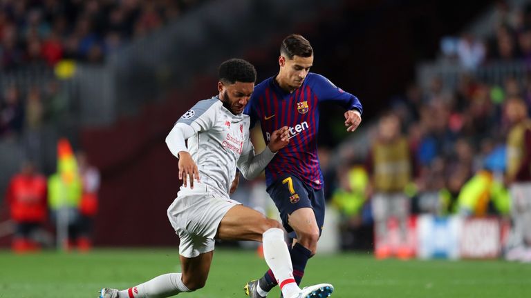 Joe Gomez and Philippe Coutinho in action during Liverpool's game against Barcelona at the Camp Nou