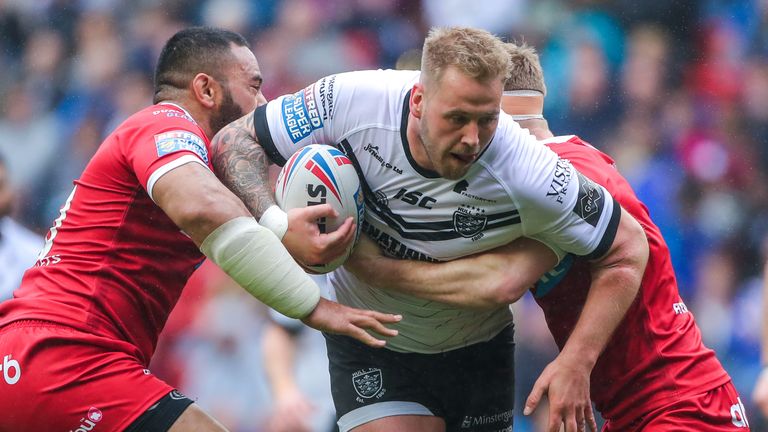 Hull FC's Joe Westerman tries in vain to find a way through the Huddersfield defence
