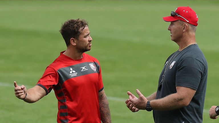 Johan Ackermann, (R) the Gloucester head coach, talks to Danny Cipriani during the Gloucester training session held at Kingsholm Stadium on August 9, 2018 in Gloucester, England.