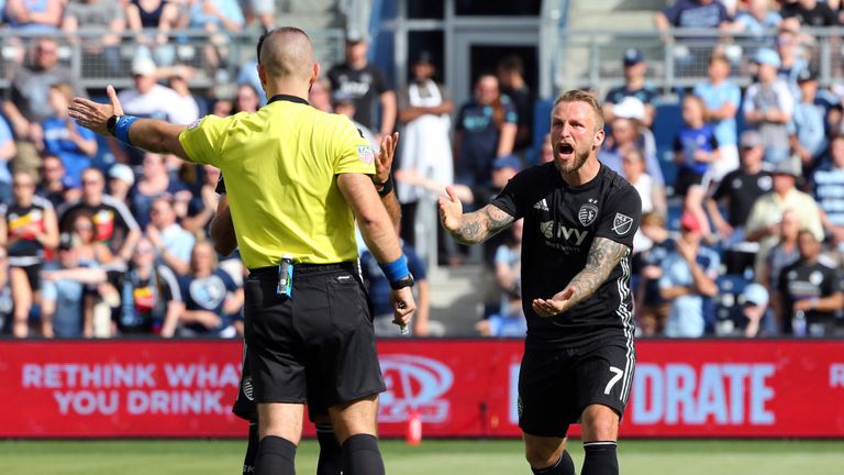 May 26, 2019; Kansas City, KS, USA; Sporting Kansas City forward Johnny Russell (7) reacts to a call by referee Chris Penso during the first half against the Seattle Sounders at Children&#39;s Mercy Park. Mandatory Credit: Jay Biggerstaff-USA TODAY Sports