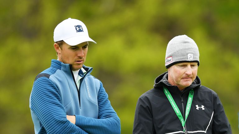 Jordan Spieth of the United States talks with his golf coach Cameron McCormick during a practice round prior to the 2019 PGA Championship at the Bethpage Black course on May 14, 2019 in Bethpage, New York. 