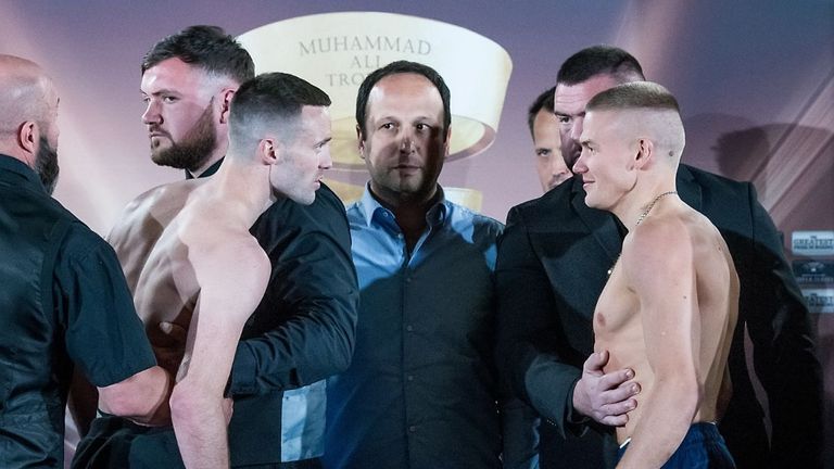 Josh Taylor and Ivan Baranchyk are held apart after their intense face-off