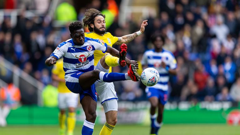 Birmingham City's Jota and Reading's Andy Yiadom in action at the Madejski Stadium