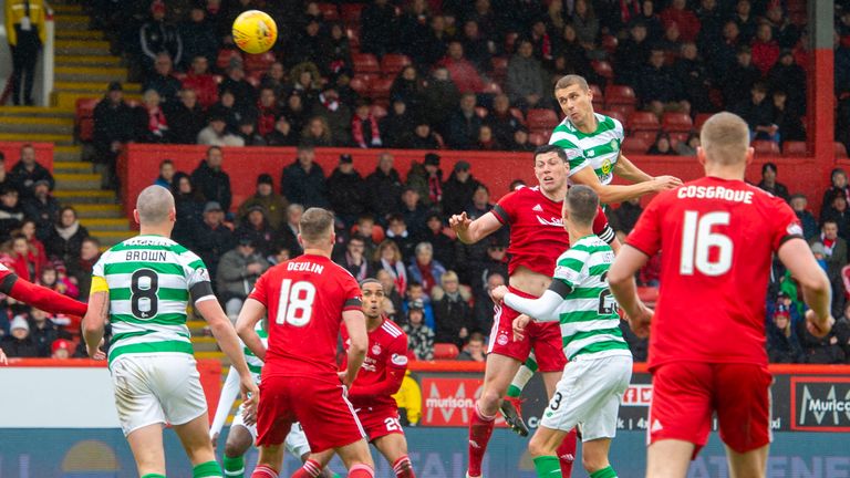 Celtic's Jozo Simunovic heads home to make it 2-0 against Aberdeen