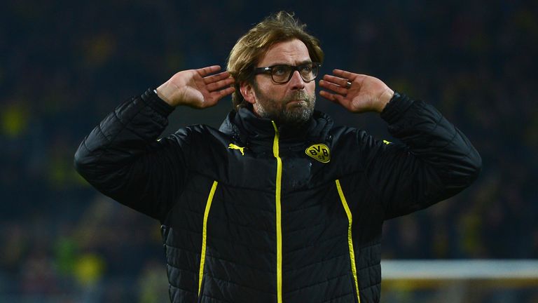 Jurgen Klopp, Coach of Borussia Dortmund gestures to fans after the UEFA Champions League Quarter Final second leg match between Borussia Dortmund and Real Madrid at Signal Iduna Park on April 8, 2014 in Dortmund, Germany.