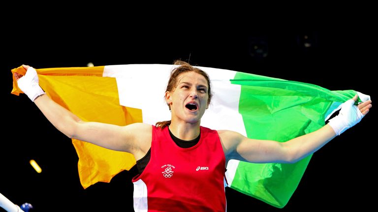 Katie Taylor celebrates beating Sofya Ochigava of Russia to win Olympic gold