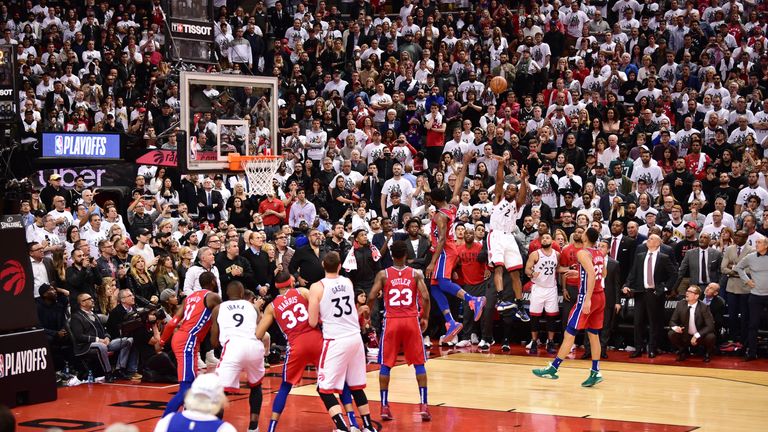 Kawhi Leonard of the Toronto Raptors shoots the game winning basket against the Philadelphia 76ers during Game Seven of the Eastern Conference Semi-Finals of the 2019 NBA Playoffs